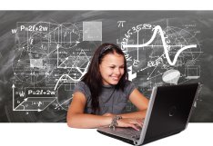 girl looking at laptop